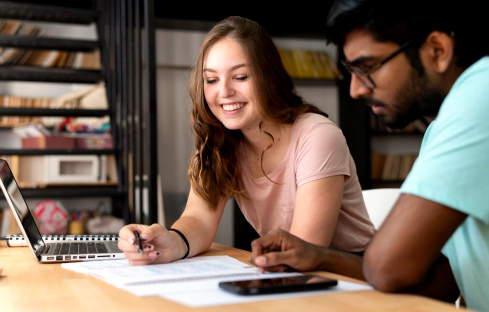 Modern office workspace with financial analysis tools and strategic planning materials